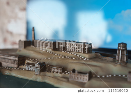 Miniature model of San Francisco showcasing diverse urban landscape with various buildings, roads, and pathways. Soft lighting creates realistic scene. 115519050
