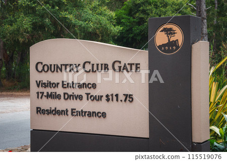 Explore the Country Club Gate sign at the entrance point to a 17 Mile Drive Tour in California. Visitor entrance fee is dollars11.75. Rich in history and lush greenery. 115519076