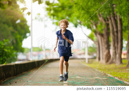 Kids run in summer park. Active child running. 115519095