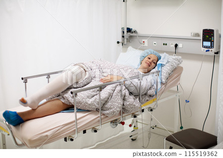 Young woman in hospital recovery room after surgery Young woman in hospital recovery room after surgery 115519362