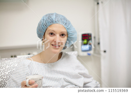 Young woman in hospital recovery room after surgery Young woman in hospital recovery room after surgery 115519369