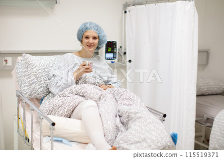 Young woman in hospital recovery room after surgery Young woman in hospital recovery room after surgery 115519371