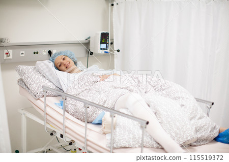 Young woman in hospital recovery room after surgery Young woman in hospital recovery room after surgery 115519372