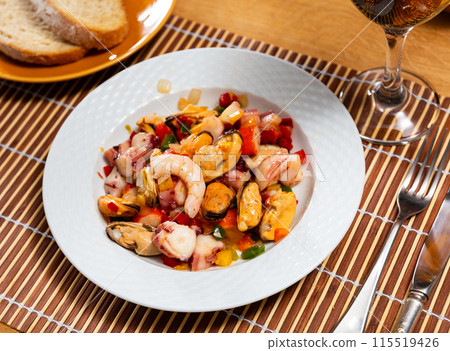 Popular Spanish appetizer, seafood salpicon, is served on plate. 115519426