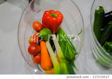 Green-yellow vegetables in a wine cooler 115519527