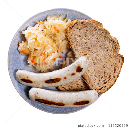 Fried sausages served with pickled cabbage Fried sausages served with pickled cabbage 115520539