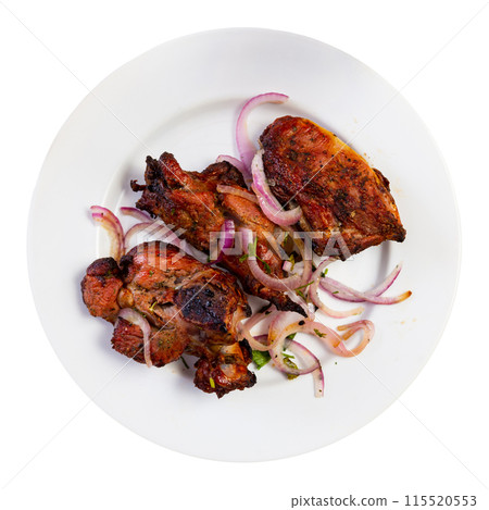 Traditional european dish Shashlik cordero - fried lamb kebab with onion on plate Traditional european dish Shashlik cordero - fried lamb kebab with onion on plate 115520553
