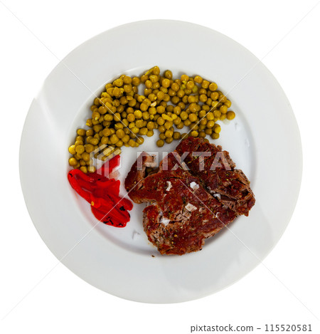 Fried beef served with peas and peppers Fried beef served with peas and peppers 115520581