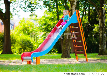 Kids explore nature. Children play in sunny park. 115521127