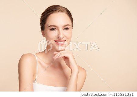 Beautiful young woman with clean fresh skin on beige background, Face care, Facial treatment, Cosmetology, beauty and spa, women portrait. Beautiful young woman with clean fresh skin on beige background, Face care, Facial treatment, Cosmetology, beauty and spa, women portrait. 115521381