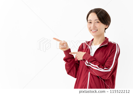 Woman in a jersey pointing 115522212