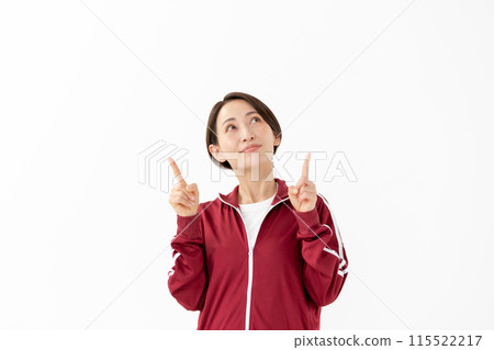Woman in a jersey pointing 115522217