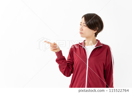Woman in jersey pointing, hype Woman in jersey pointing, hype 115522764