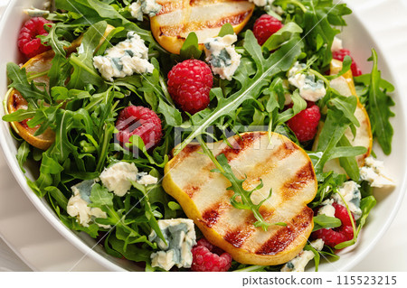 grilled pear salad with cheese, arugula, berries 115523215