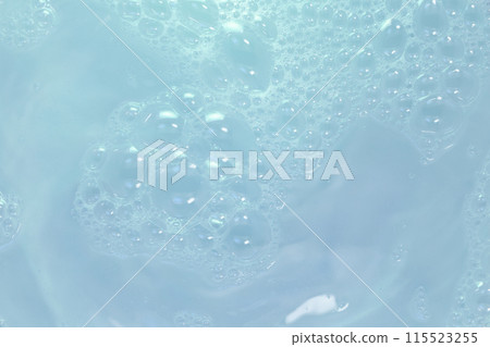Countless detergent bubbles floating on water. 115523255