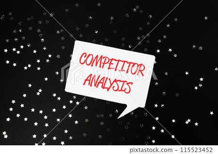 A white sign with red letters that says Competitor Analysis A white sign with red letters that says Competitor Analysis 115523452