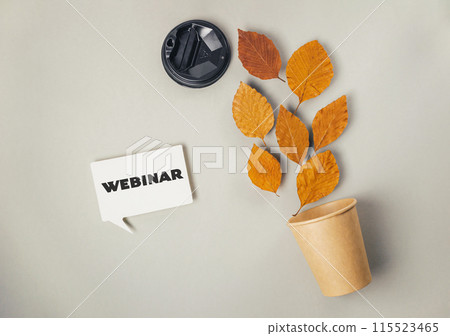 A white sign with the word webinar written on it 115523465