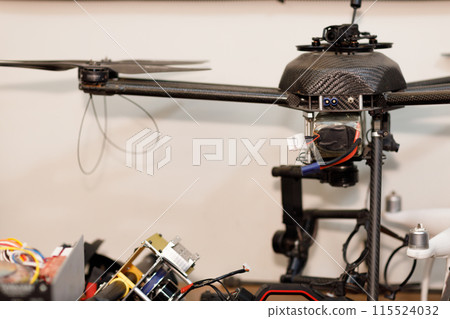 Workshop and repair production custom UAV quadcopter drone with parts stuff. Workshop and repair production custom UAV quadcopter drone with parts stuff. 115524032