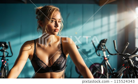 Fit and enthusiastic Black lingerie model in spinning class wearing moisture wicking vibrant lingerie set Fit and enthusiastic Black lingerie model in spinning class wearing moisture wicking vibrant lingerie set 115524343
