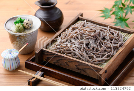 Zaru soba (condiments: chopped green onion, quail eggs, wasabi) 115524792