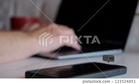 smart phone mobile receiving mail message, email notification alarm appears on smartphone screen on desk table 115524851