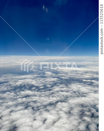 Cloud seen from an airplane 115525618