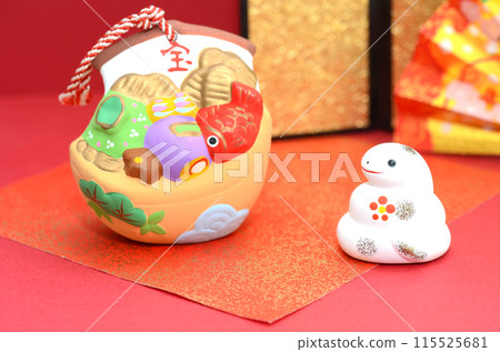 2025 New Year's card material, Year of the Snake, Snake figurine, red background 2025 New Year's card material, Year of the Snake, Snake figurine, red background 115525681