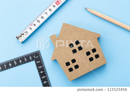 A square and a house object on a blue background 115525956