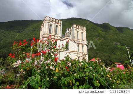 Notre Dame Church in the village of Salazy, the base of the Cirque de Salazy, a World Heritage Site on the French overseas island of Reunion Notre Dame Church in the village of Salazy, the base of the Cirque de Salazy, a World Heritage Site on the French overseas island of Reunion 115526804