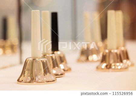 Music bells on a table 115526956