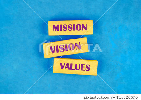 Business mission vision values concept. Copy space. Concept words Mission Vision Values on blocks made of wood, top view Conceptual photo Business mission vision values concept. Copy space. Concept words Mission Vision Values on blocks made of wood, top view Conceptual photo 115528670