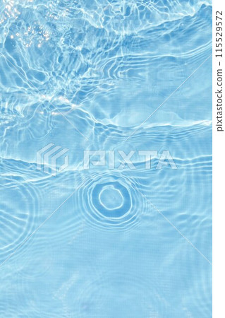 Abstract water, cosmetic background with rings, water surface. Background with spa concept, waves in the pool Abstract water, cosmetic background with rings, water surface. Background with spa concept, waves in the pool 115529572