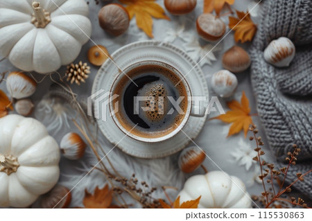 Warm Autumn Coffee With a Pumpkin and Knit Blanket 115530863