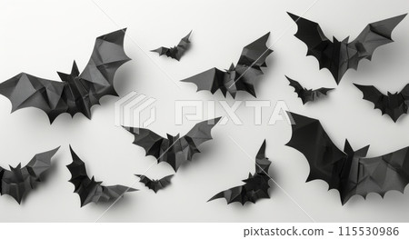 Black Paper Bats Decorated on a White Wall for Halloween Black Paper Bats Decorated on a White Wall for Halloween 115530986