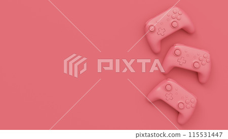 Video game joysticks or gamepads in plain monochrome pink color background 115531447