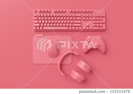 Modern home office setup featuring keyboard, gaming controllers and headphones 115531478