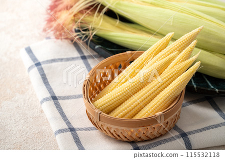 Corn tips, corn shoots, vegetables, baby corn husk Corn tips, corn shoots, vegetables, baby corn husk 115532118