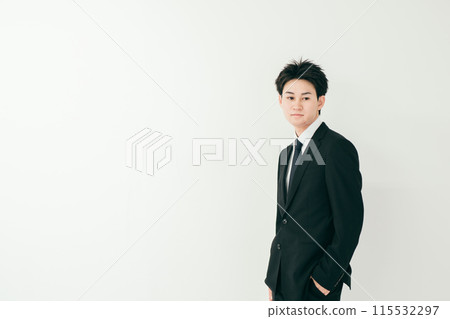 A young man in a suit A young man in a suit 115532297