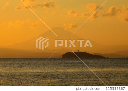 The silhouette of Mt. Fuji and Enoshima as seen from Zushi Beach at dusk The silhouette of Mt. Fuji and Enoshima as seen from Zushi Beach at dusk 115532867