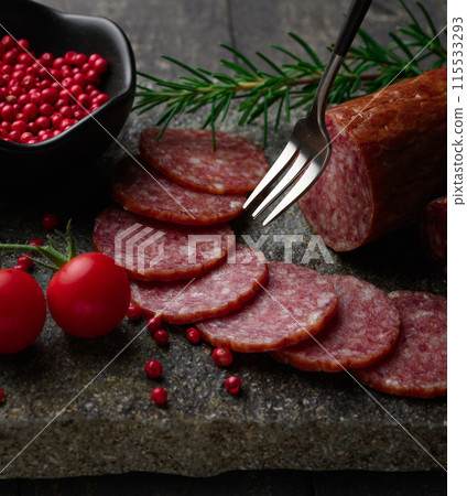 Aged salami on a cutting board 115533293