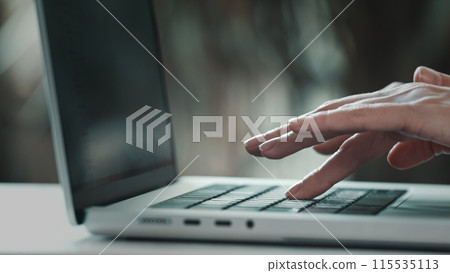 Typing on keyboard. Close up hands busy working on laptop or computer keyboard for send emails and surf on a web browser. Business technologies concept. Software, online education, apps, modern tech 115535113