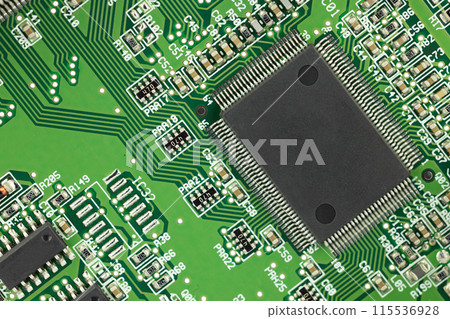 Detailed Green Circuit Board with Multiple Chips 115536928