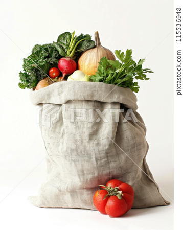 Assorted fresh vegetables in reusable cloth bag on white background. Eco friendly and sustainable shopping concept. Design for grocery, health, and organic food poster. Ai generation. 115536948