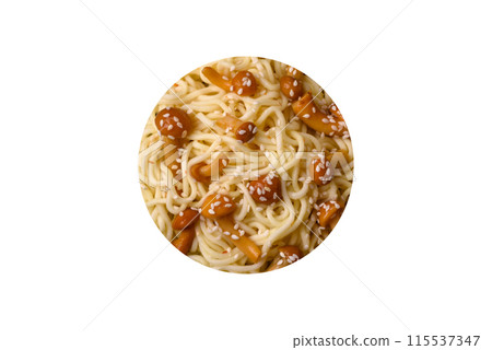 Delicious Asian cuisine dish with rice noodles, peppers, mushrooms and spices Delicious Asian cuisine dish with rice noodles, peppers, mushrooms and spices 115537347