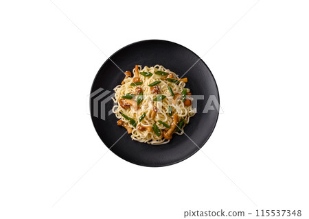 Delicious Asian cuisine dish with rice noodles, peppers, mushrooms and spices Delicious Asian cuisine dish with rice noodles, peppers, mushrooms and spices 115537348