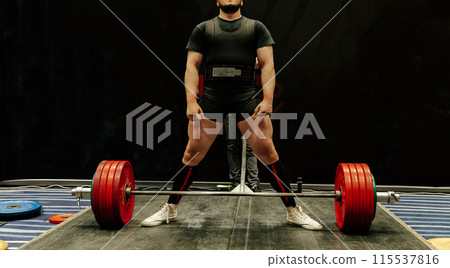 man athlete get ready deadlift at powerlifting competition 115537816