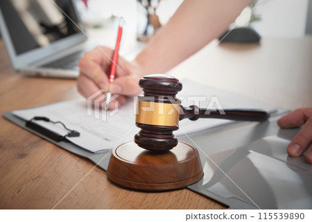 Lawyer or attorney signing documents Lawyer or attorney signing documents 115539890