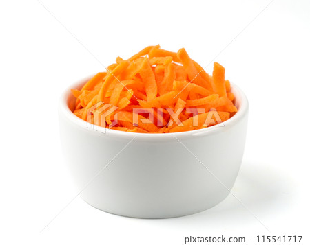 Fresh organic shredded carrots in small white bowl. Raw grated carrots isolated on white with clipping path. Fresh organic shredded carrots in small white bowl. Raw grated carrots isolated on white with clipping path. 115541717