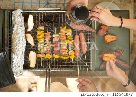 People Grilling Food at Party People Grilling Food at Party 115541978