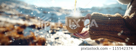 person enjoys a hot cup of coffee, with the backdrop of majestic mountains behind them. 115542374